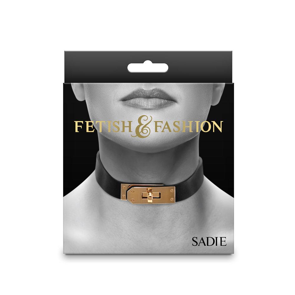 Black Fetish & Fashion Sadie Collar with gold-tone adjustable buckle and O-ring on packaging display