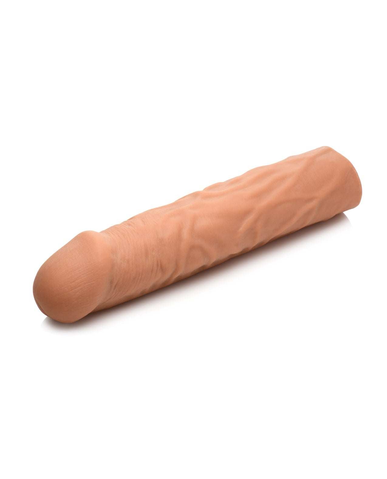 Curve Toys Jock 3-inch extra long penis extension sleeve with realistic texture and flesh tone.
