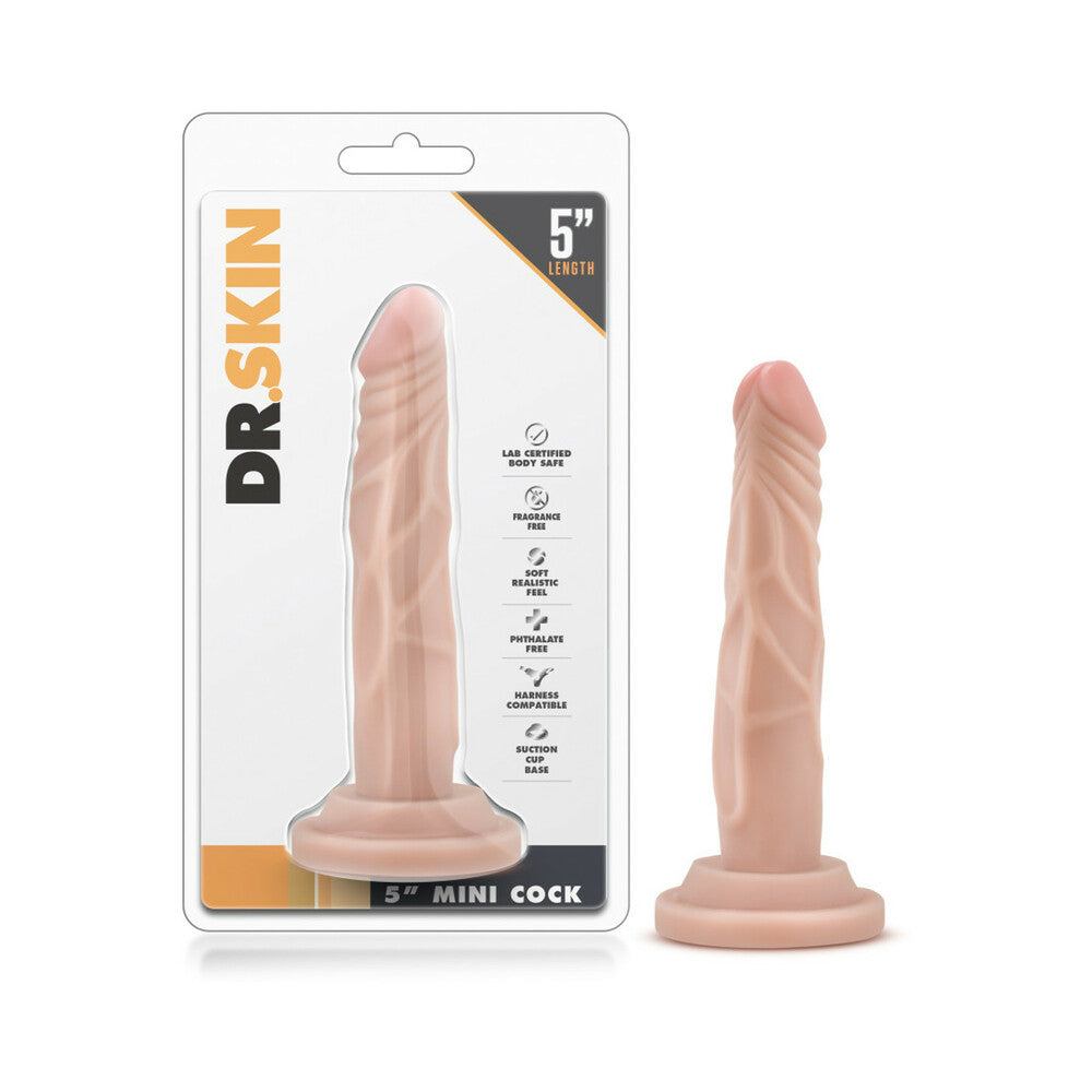 Dr. Skin Mini Realistic 5 inch beige dildo with suction cup base and lifelike texture in packaging and out of package