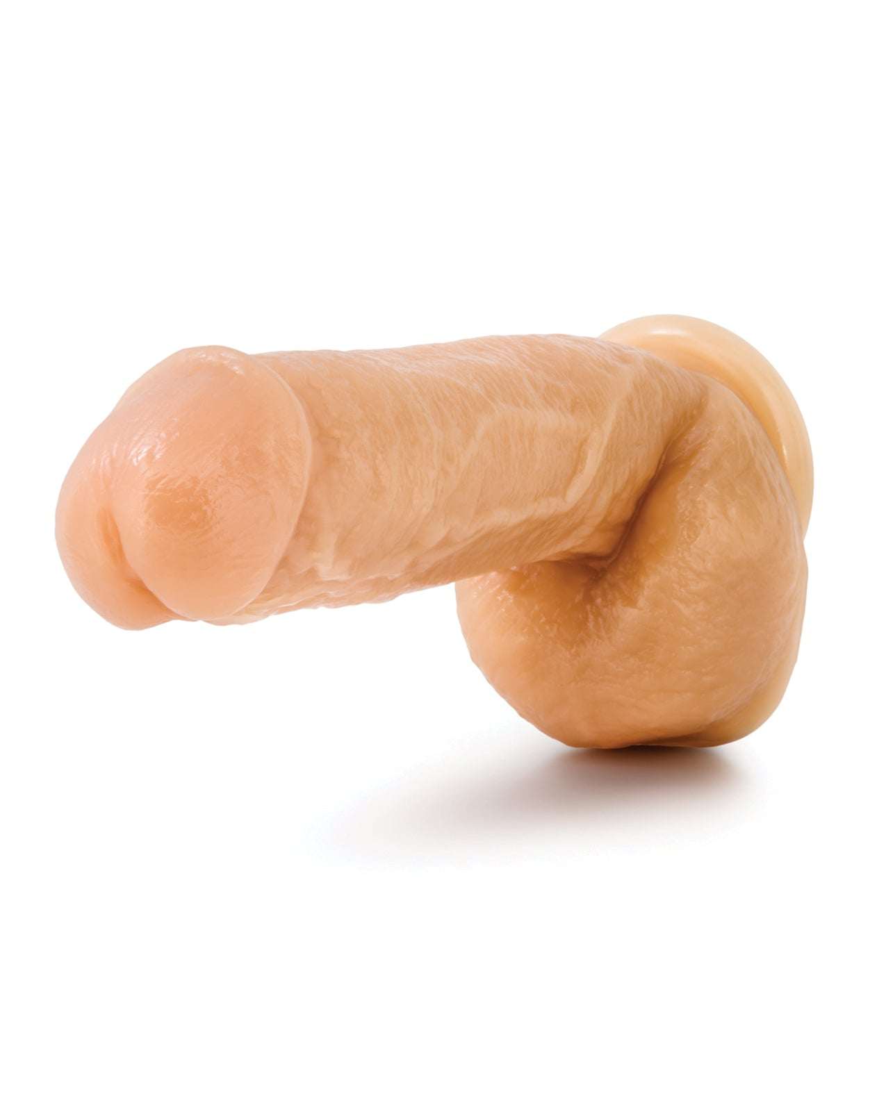 Blush Hung Rider Trigger 7-inch flesh-tone dildo with textured surface and suction cup base for hands-free use