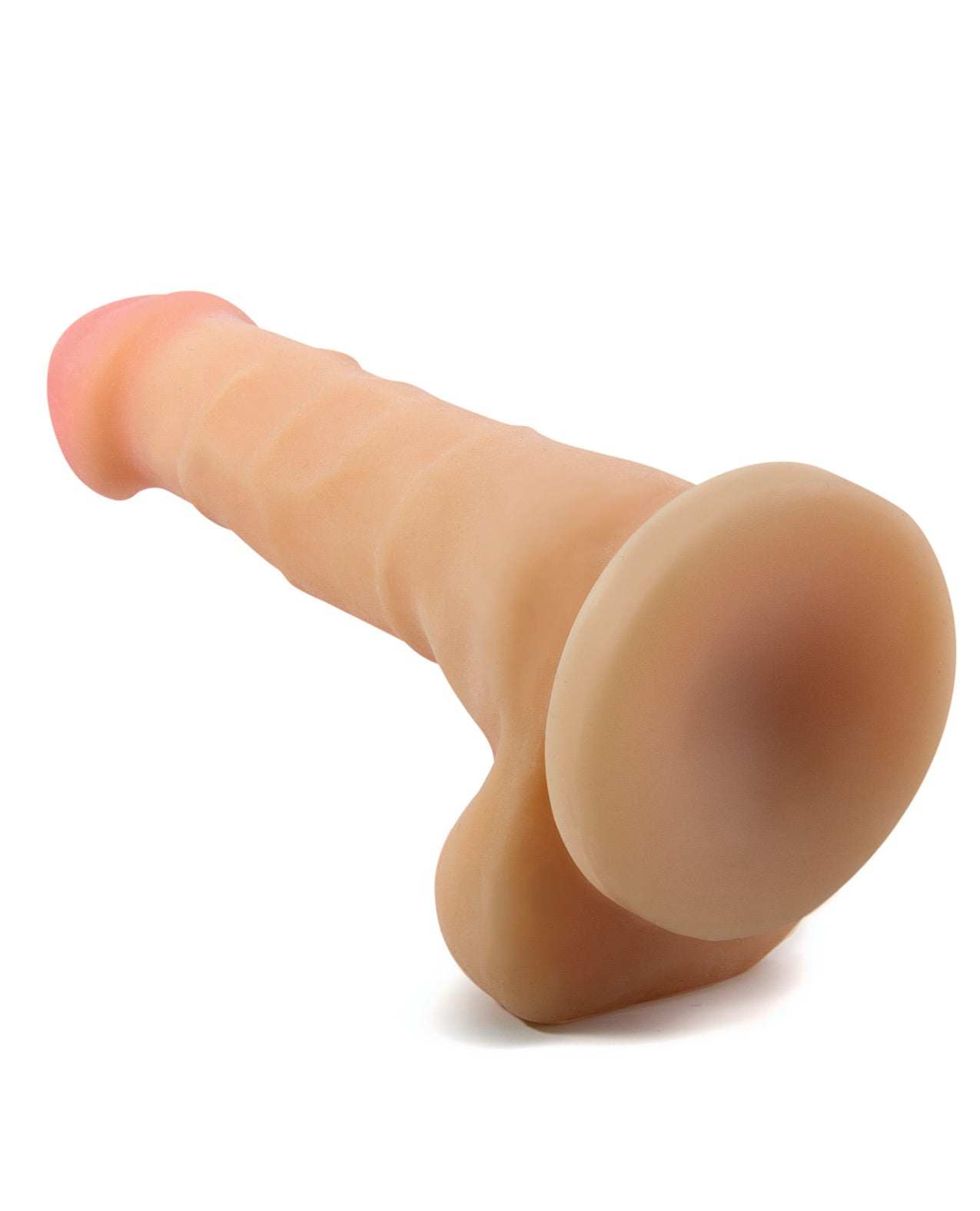 Blush Au Naturel 7 inch Sam beige dildo with realistic veined shaft, posable design, squeezable balls, and suction cup base