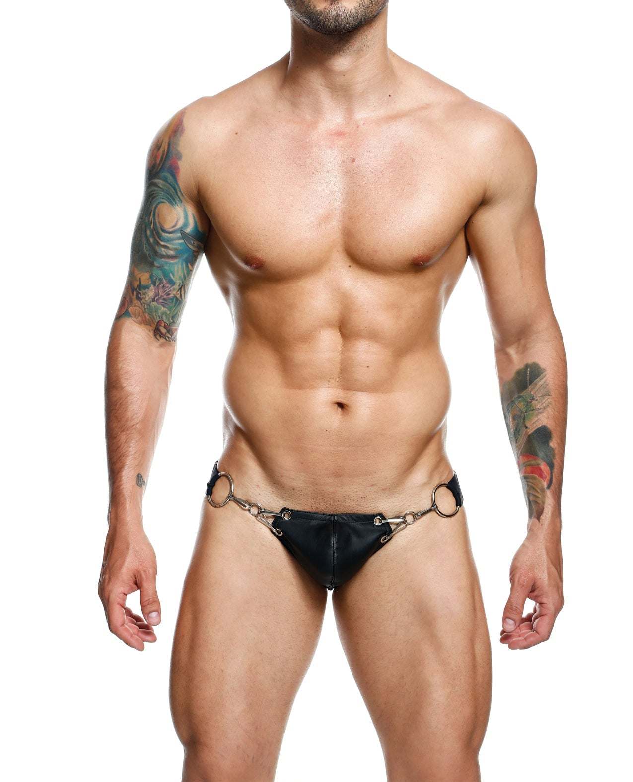 Man wearing black Dngeon Snap Jockstrap with chain-link pouch and wide straps, showcasing a bold and minimal design.