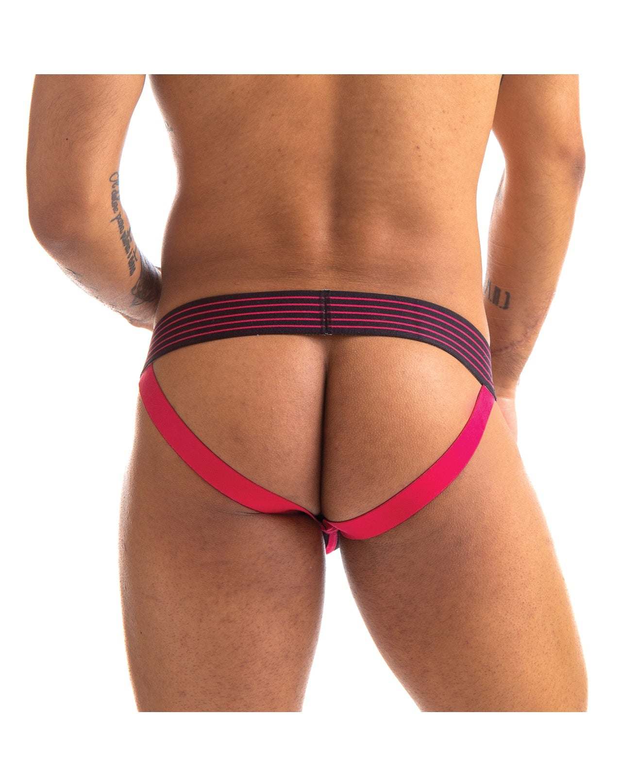 Back view of a man wearing a 665 Rally Jockstrap with a black and red waistband and red straps.
