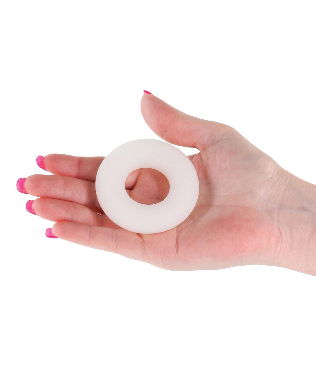 Hand holding large white Firefly Glow in the Dark Bubble Cock Ring made of soft liquid silicone