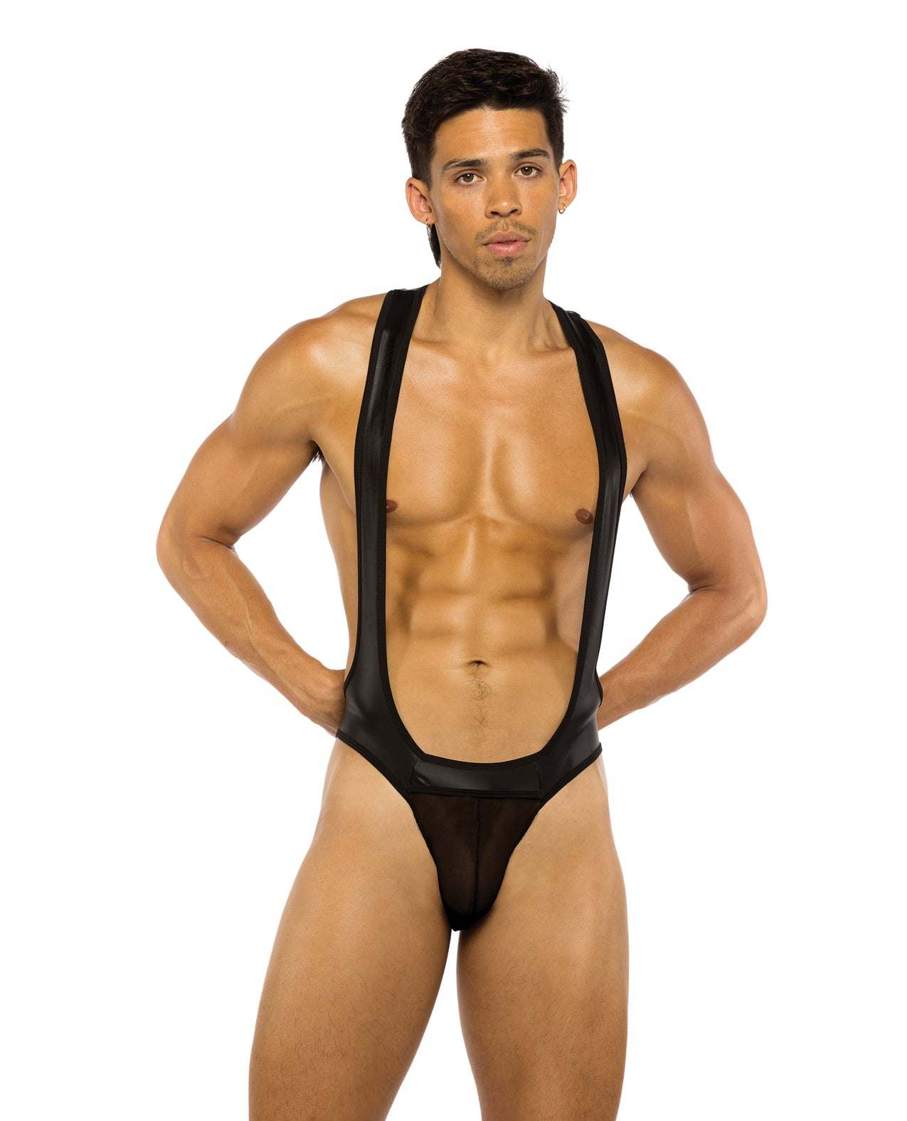 Muscular man wearing black men's wrestling jockstrap singlet with open chest and high-cut legs