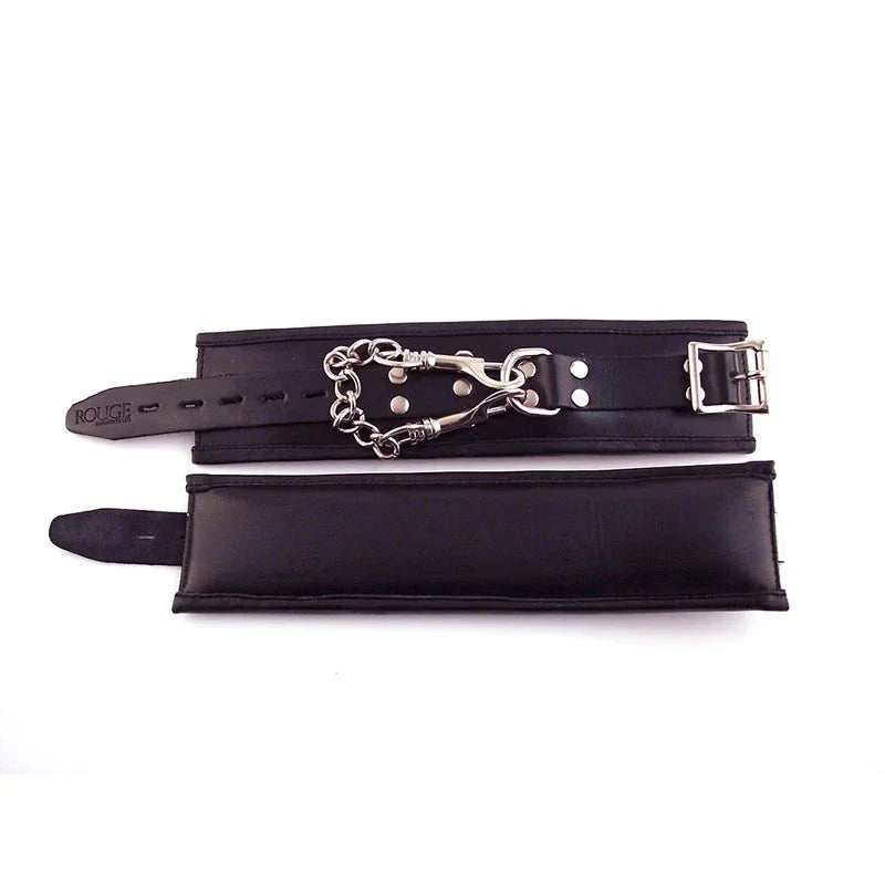 Black padded leather Rouge wrist cuffs with adjustable buckle straps and detachable trigger hook chain.