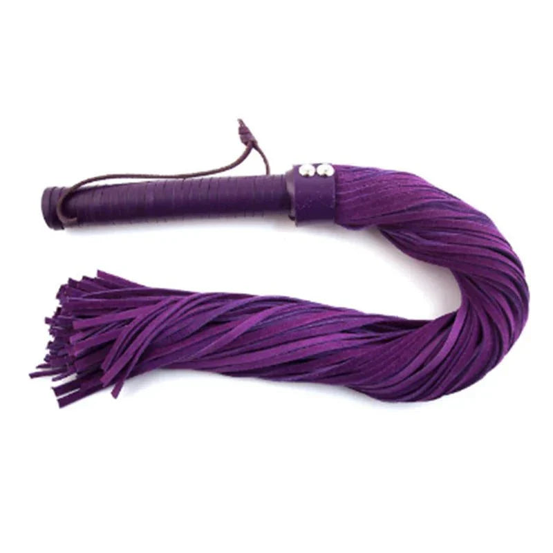 Rouge Suede Flogger in black and purple with leather handle and soft suede tails for intimate play
