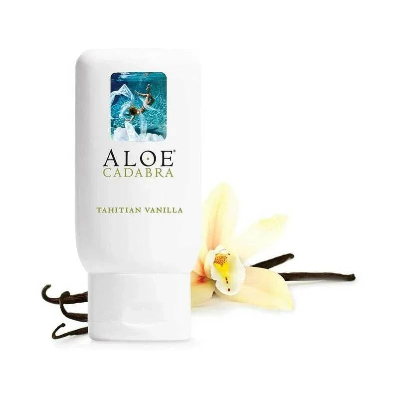 Aloe Cadabra Tahitian Vanilla organic aloe lubricant with vanilla flower and pods background