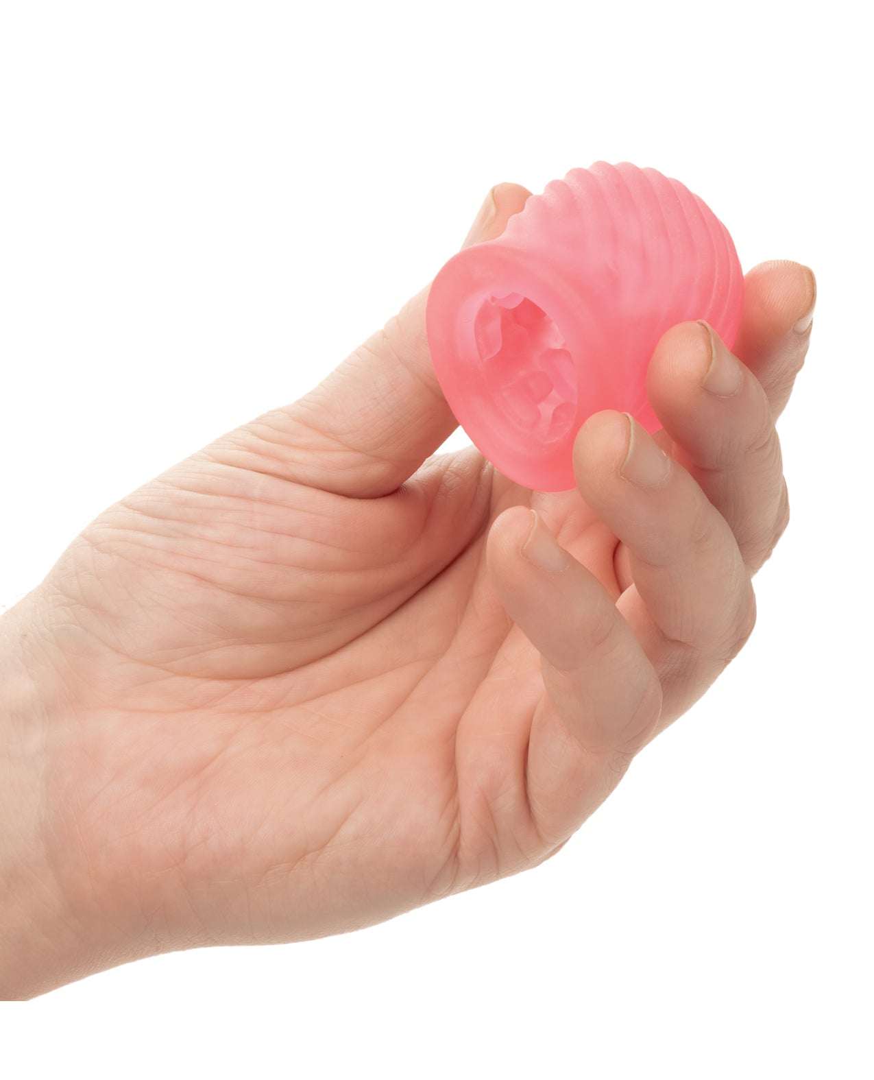 Hand holding a pink Pop Sock! Tickler stroker with textured reversible design for enhanced pleasure