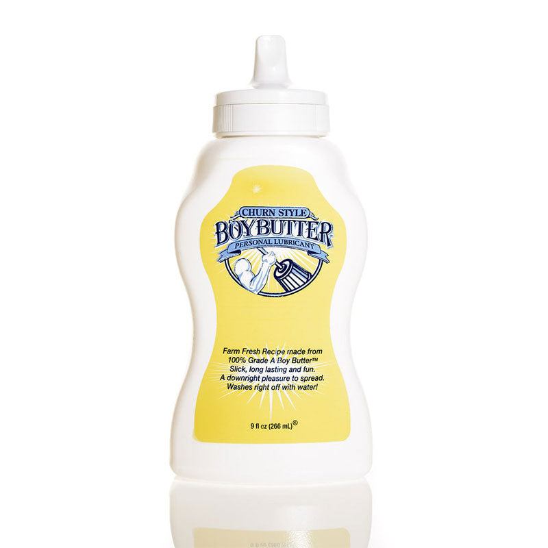 Boy Butter 9oz Squeeze personal lubricant in a white plastic bottle with yellow label for men’s intimate use.