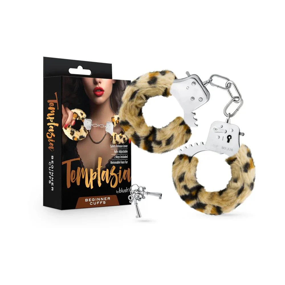 Temptasia Beginner Cuffs Leopard with removable faux fur, stainless steel, safety release lever, and adjustable fit for beginner bondage play.