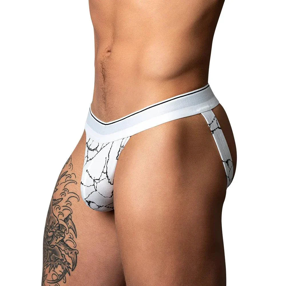 Male Power Soo Cumfy Jock in black and white with marble print, low-rise waistband, and fabric-covered leg bands, size L/XL.