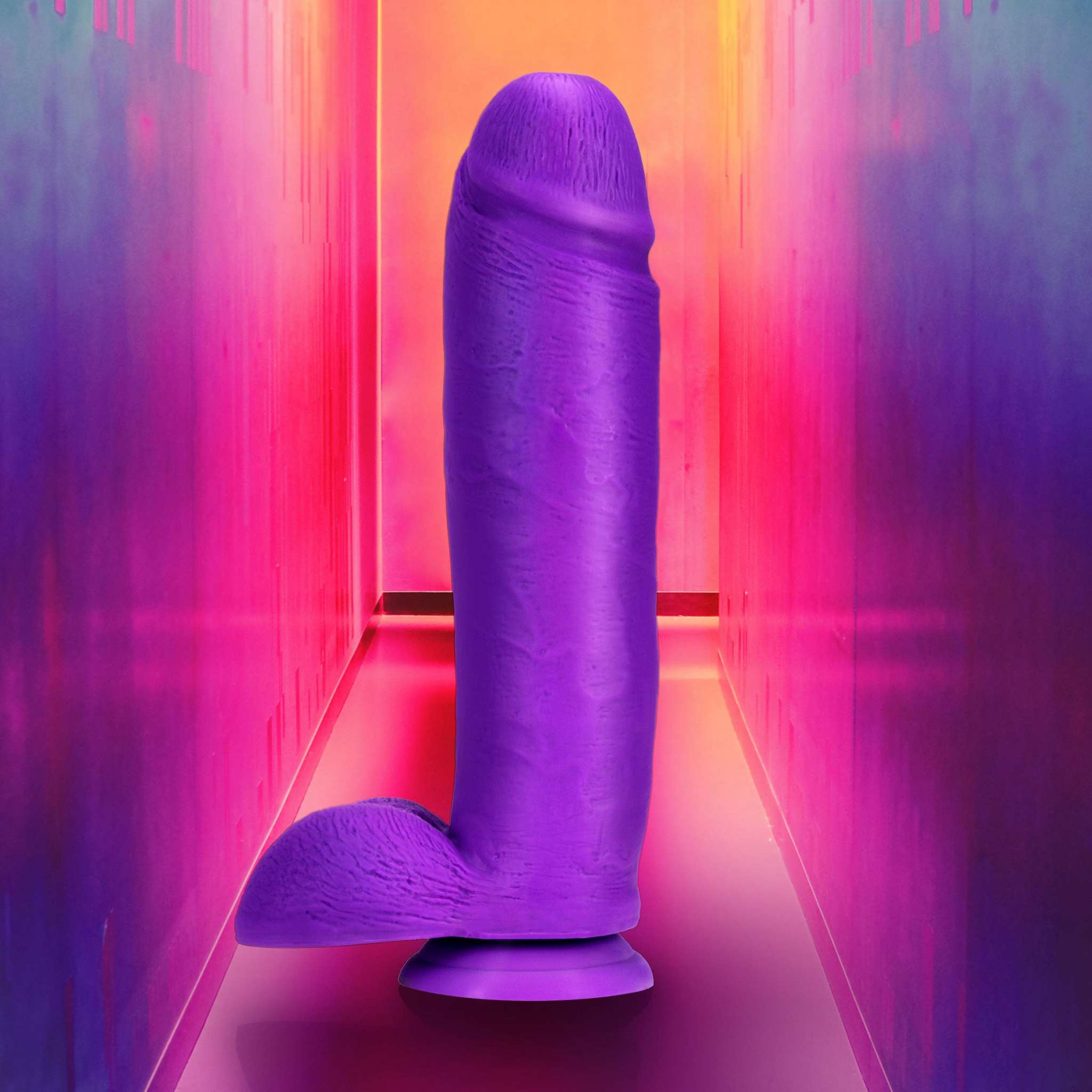 Neo Elite 10 inch neon purple silicone dual density dildo with suction cup base and balls