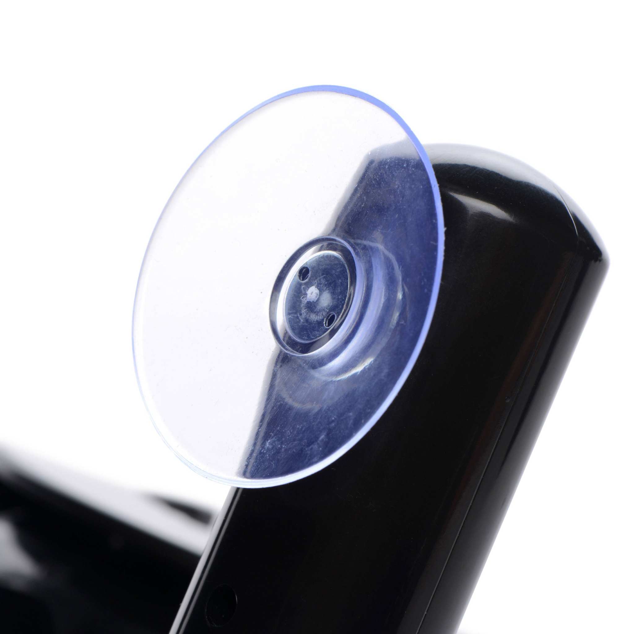 Pro-Bang Sex Machine close-up of suction cup mount on black portable device with remote control features