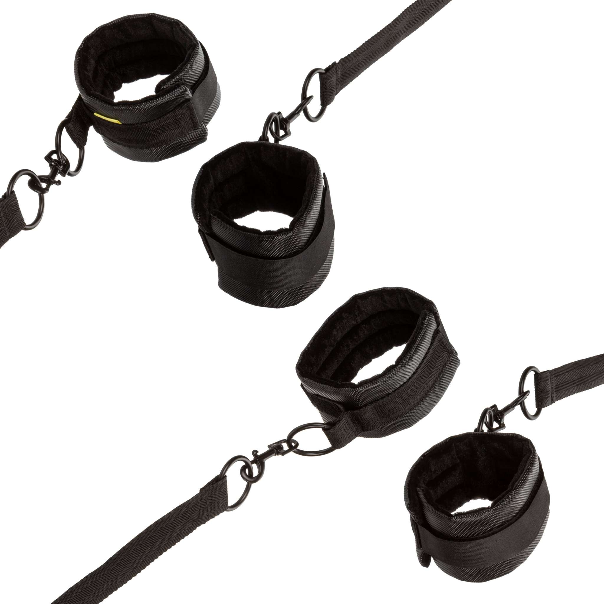 Black adjustable Boundless Bed Restraint set with four padded wrist and ankle cuffs and sturdy tethers with swivel clasps for secure bedroom use.