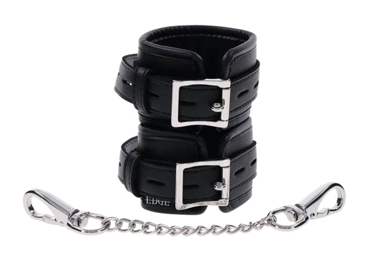 Black Edge Handcuffs with padded cuffs, silver buckles, reinforced stitching, and a detachable silver chain restraint.