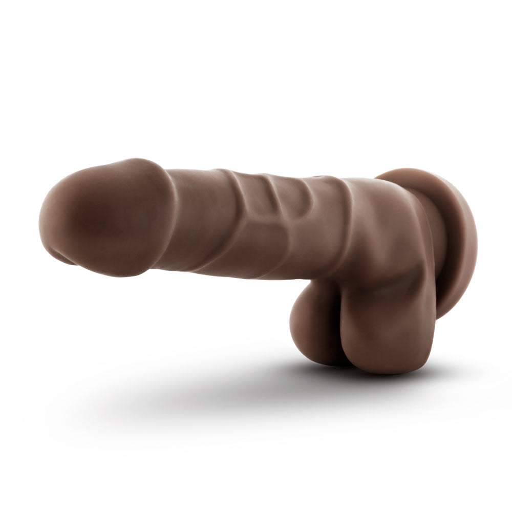Dr. Skin realistic chocolate-colored dildo with suction cup base and 7.75 inches length