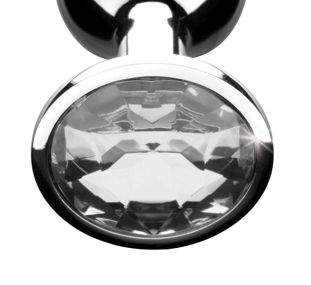 Small clear gem anal plug with smooth metal finish and tapered shape in lightweight aluminum