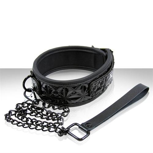 Black adjustable Sinful Collar with chain leash for kink and bondage play.