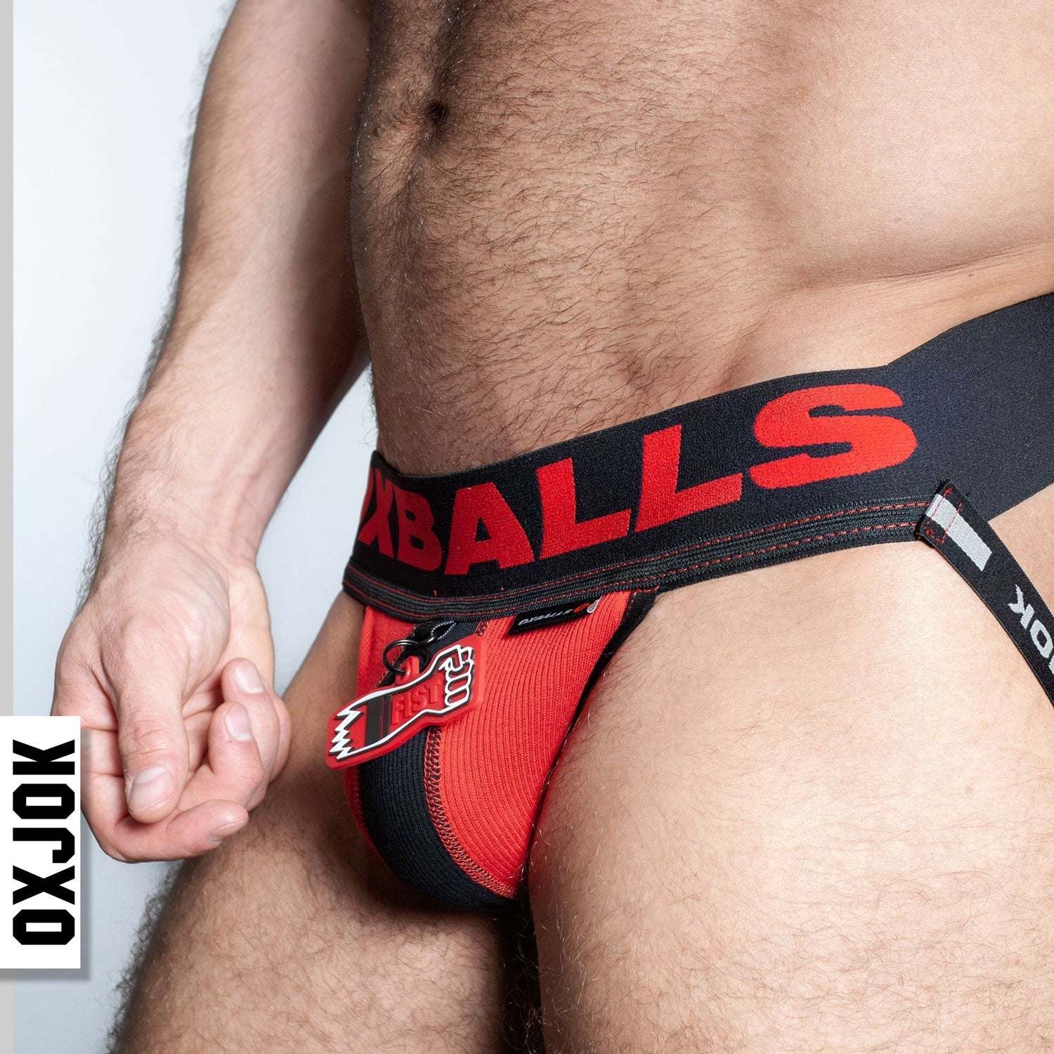Fisterjock 3D Fist Tagger Jock in black and red large with bold waistband and 3D fist tag detailing