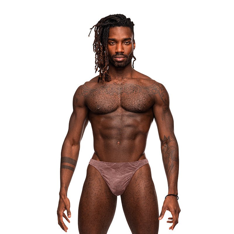 Male model wearing Male Power Inter-Mingle Bong V Thong in blue with contoured pouch and stretch poly spandex fabric.