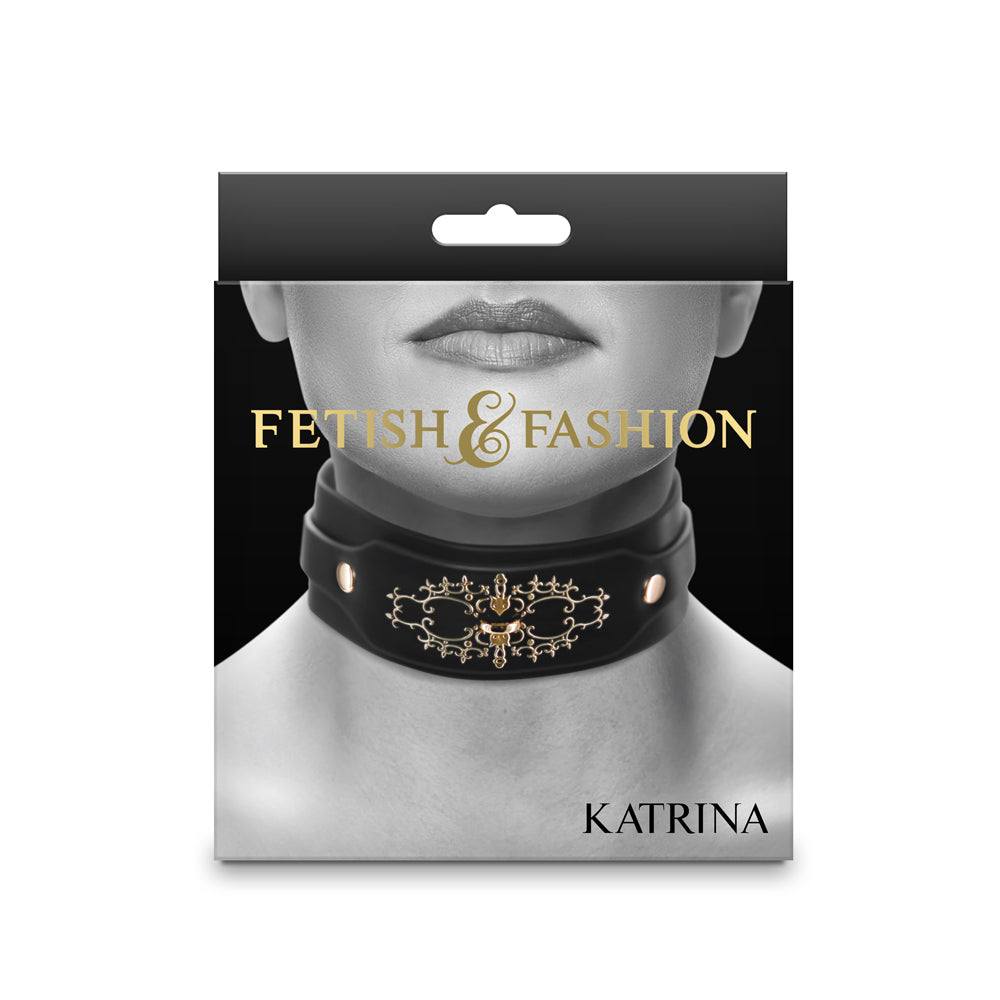 Black Fetish & Fashion Katrina Collar with gold embellishments and adjustable buckle on packaging display