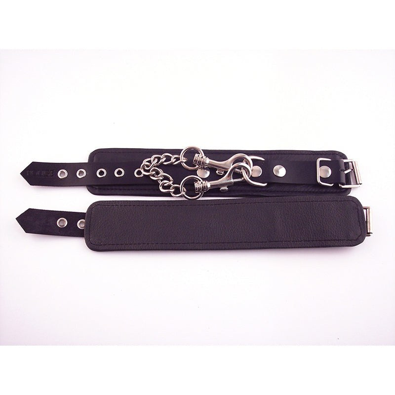 Black leather Rouge Wrist Cuffs with adjustable buckle straps and detachable metal chain detail