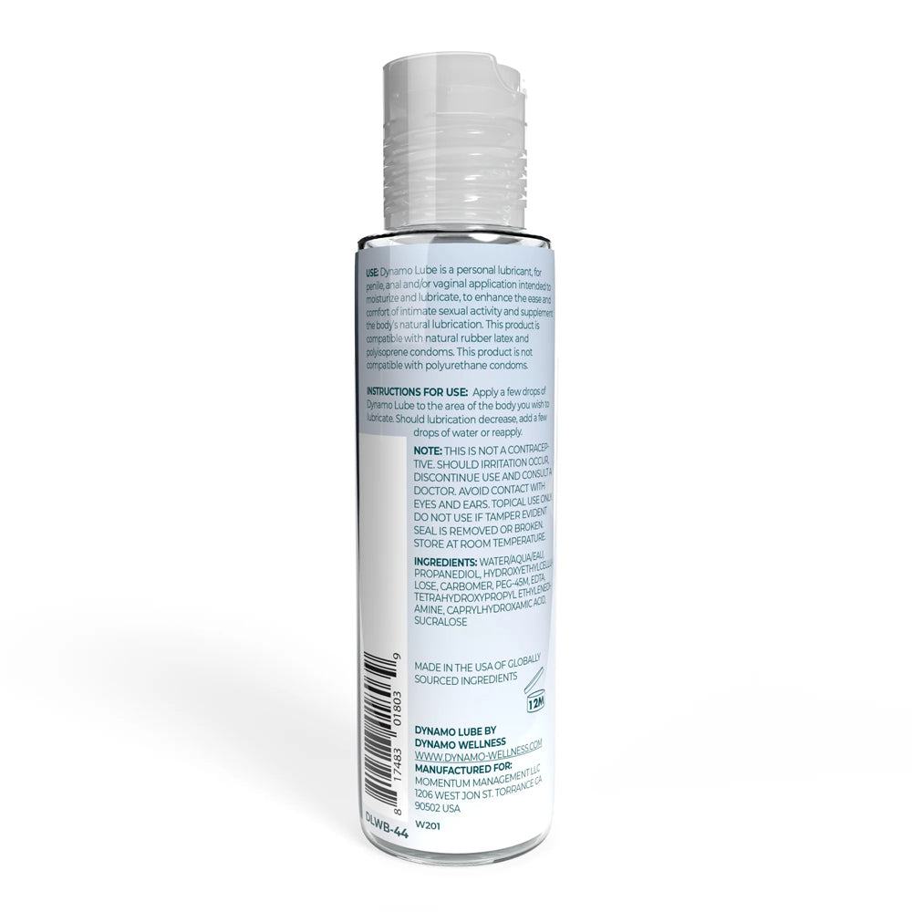 Back view of Dynamo Lube Water-Based Formula lubricant bottle showing product label and usage instructions.