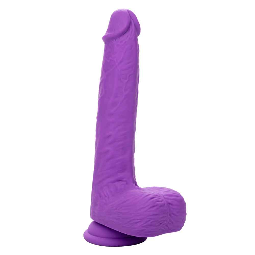 Purple rechargeable gyrating and thrusting silicone stud with suction cup base and realistic design
