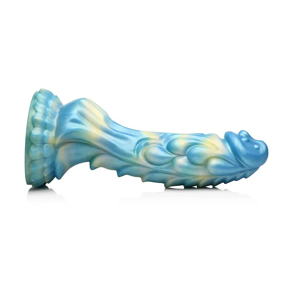 Creature Cocks Sea Stallion Vibrating Silicone Dildo with blue and yellow iridescent design.