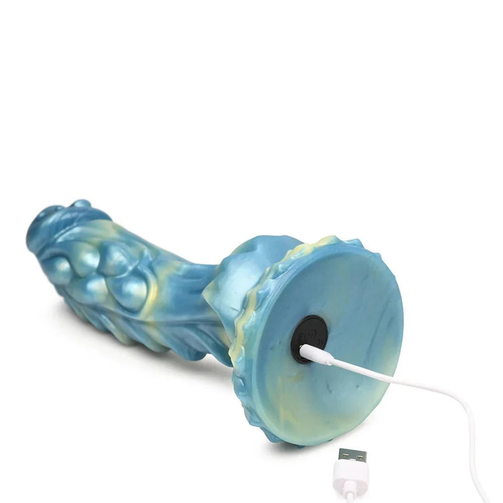 Blue and yellow Creature Cocks Sea Stallion Vibrating Silicone Dildo with Remote, featuring an iridescent design, ribbed scales, and suction cup base.