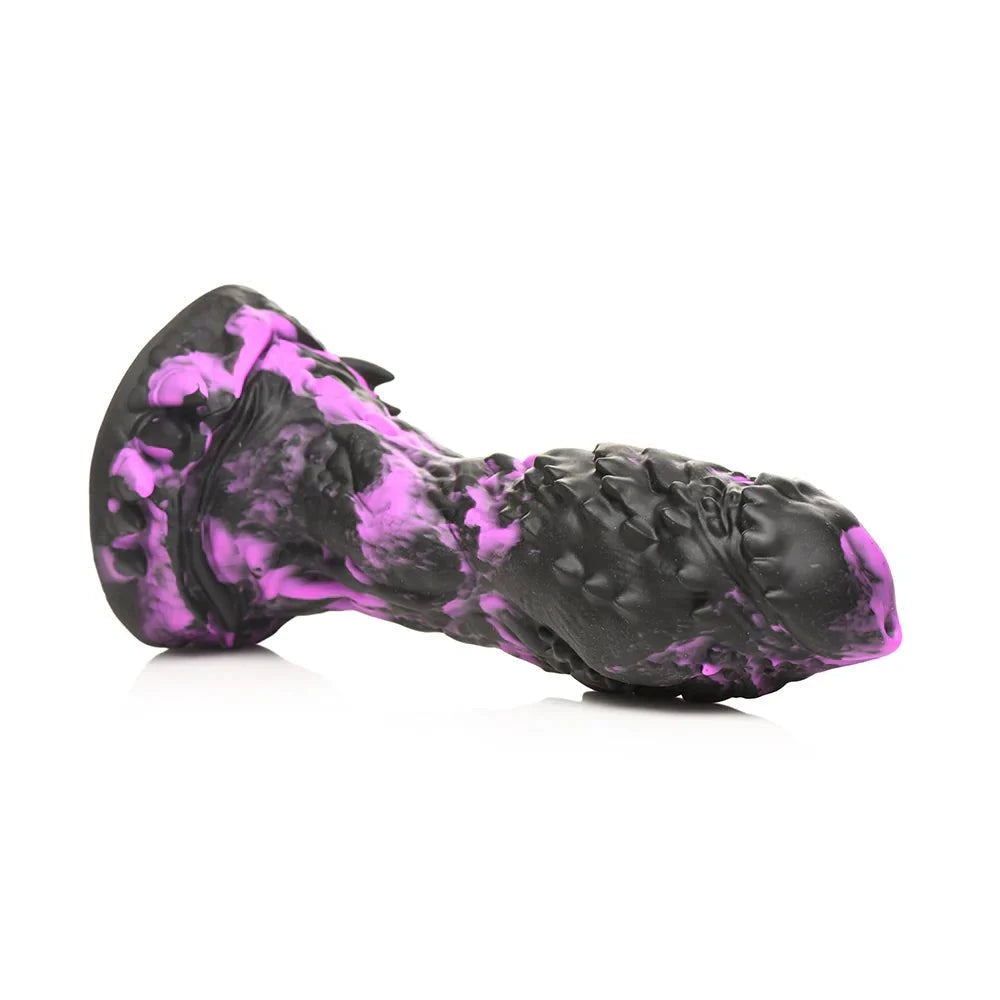 Purple and black Creature Cocks Grim Silicone Dildo with textured ridges and suction cup base.