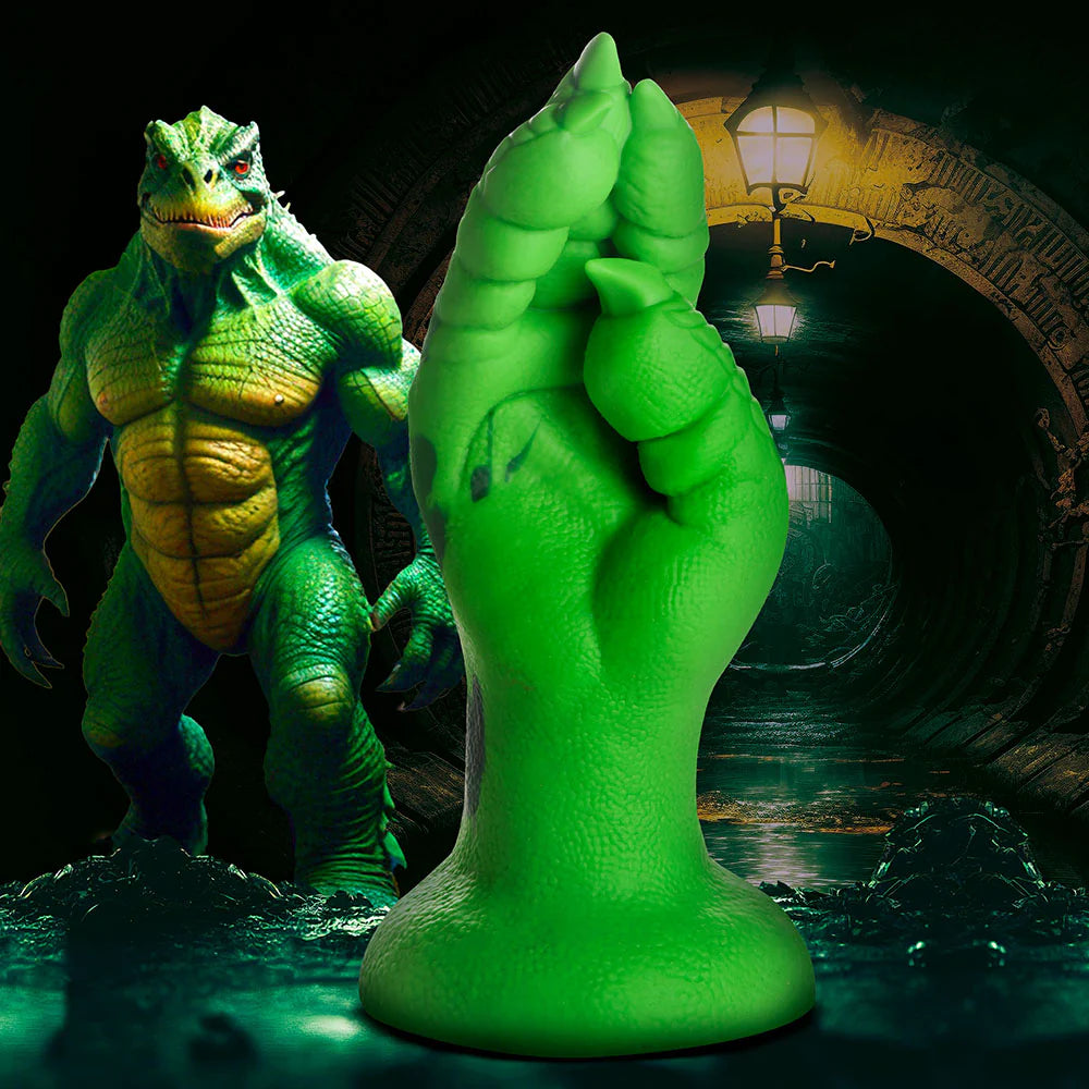 Creature Cocks Raptor Claw Fisting Silicone Dildo with scales and suction-cup base in fantasy setting.