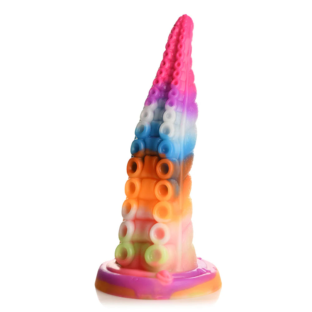 Creature Cocks Luminoctopus Glow-in-the-Dark Tentacle Dildo with rainbow colors and suction cup base.