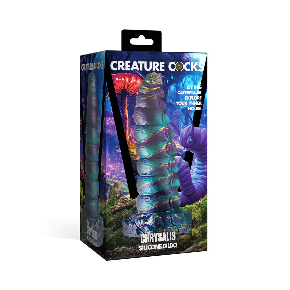 Creature Cocks Chrysalis Silicone Dildo in packaging with vibrant, iridescent colors and fantasy-themed design.