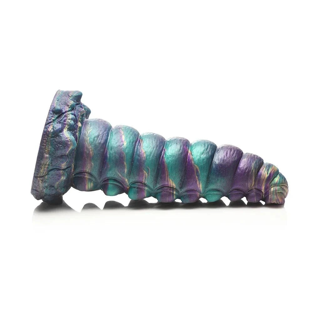 Teal, purple, and gold iridescent silicone dildo with segment textures and suction cup base.