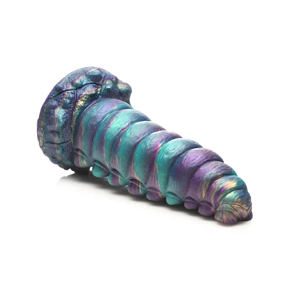 Teal, purple, gold, and blue iridescent Creature Cocks Chrysalis Silicone Dildo with bulging segments and suction cup base.