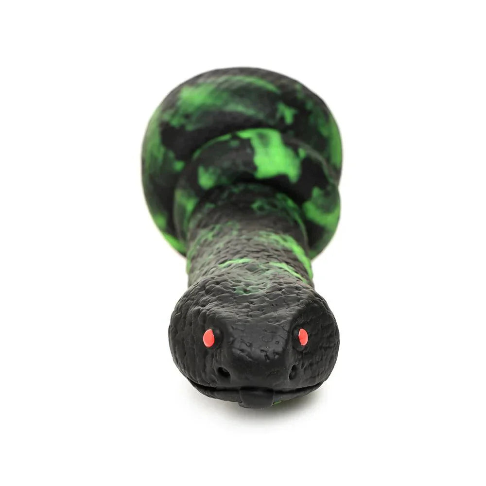 Creature Cocks Python Silicone Dildo with black and green scales, red glowing eyes, strong suction cup base.