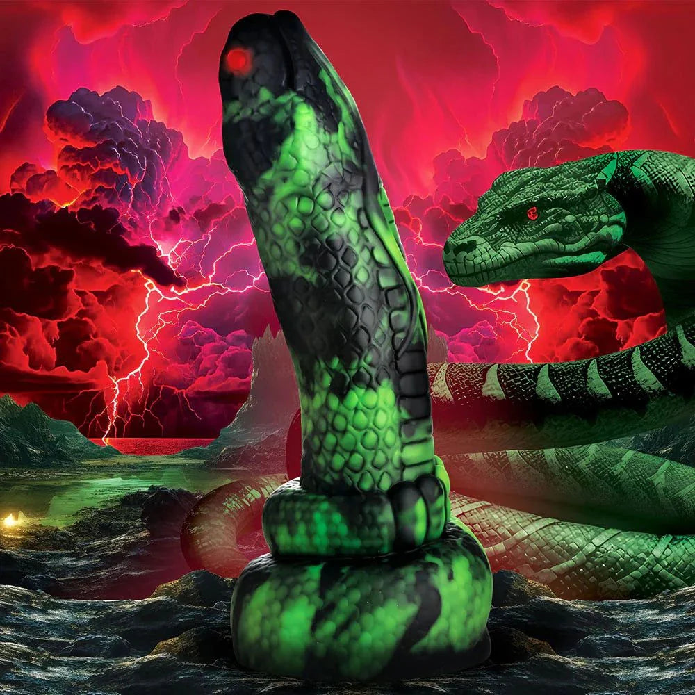 Creature Cocks Python Silicone Dildo with red eyes and green scales in fantasy setting.