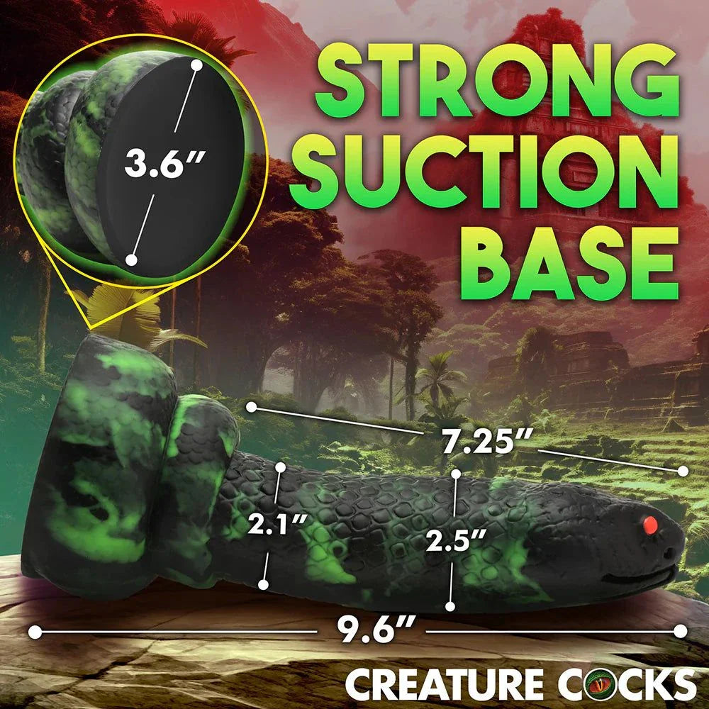 Creature Cocks Python Silicone Dildo with suction base and detailed measurements on green and black scale design.