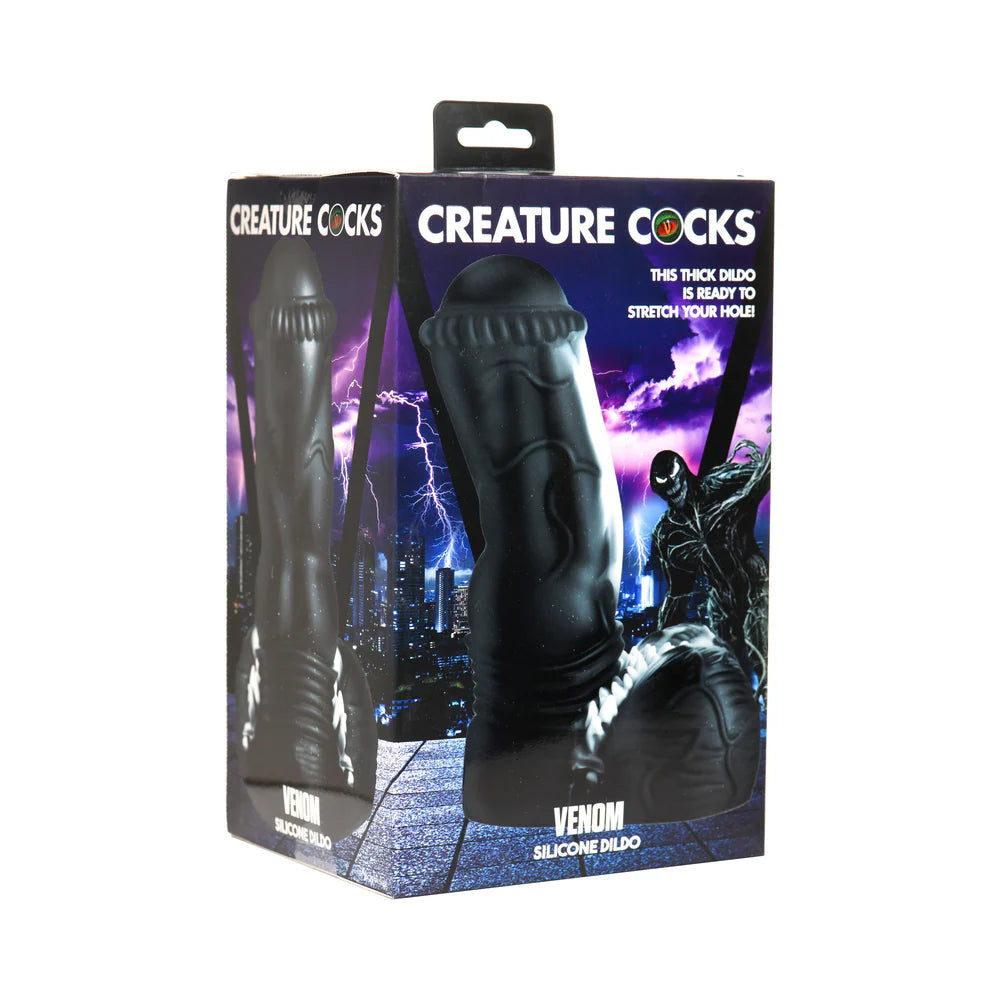 Creature Cocks Venom Silicone Dildo in packaging, fantasy-inspired black and white adult toy with ribbed texture and suction cup base.