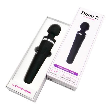 Lovense Domi 2 Mini Wand Vibrator in packaging with sleek design and Bluetooth connectivity.