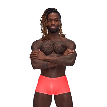 Male model wearing coral Male Power Barely There Mini Short with low-cut waist and silky smooth fit