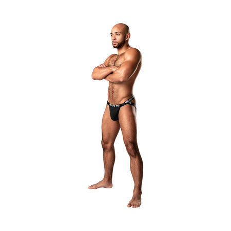 Male Power Infinite Comfort Amplifying Strappy Jock with striking design and elastic waistband displayed on a model.