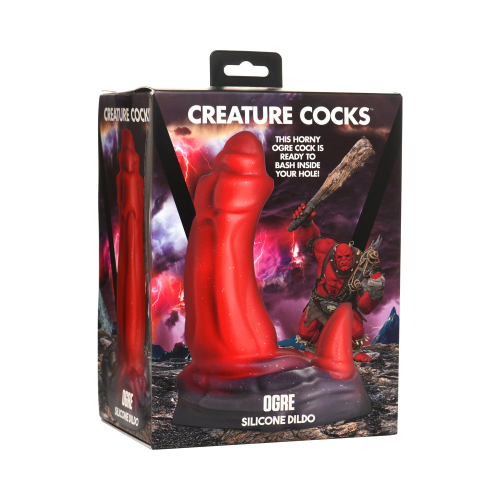 Creature Cocks Ogre Silicone Dildo in packaging with fantasy background.