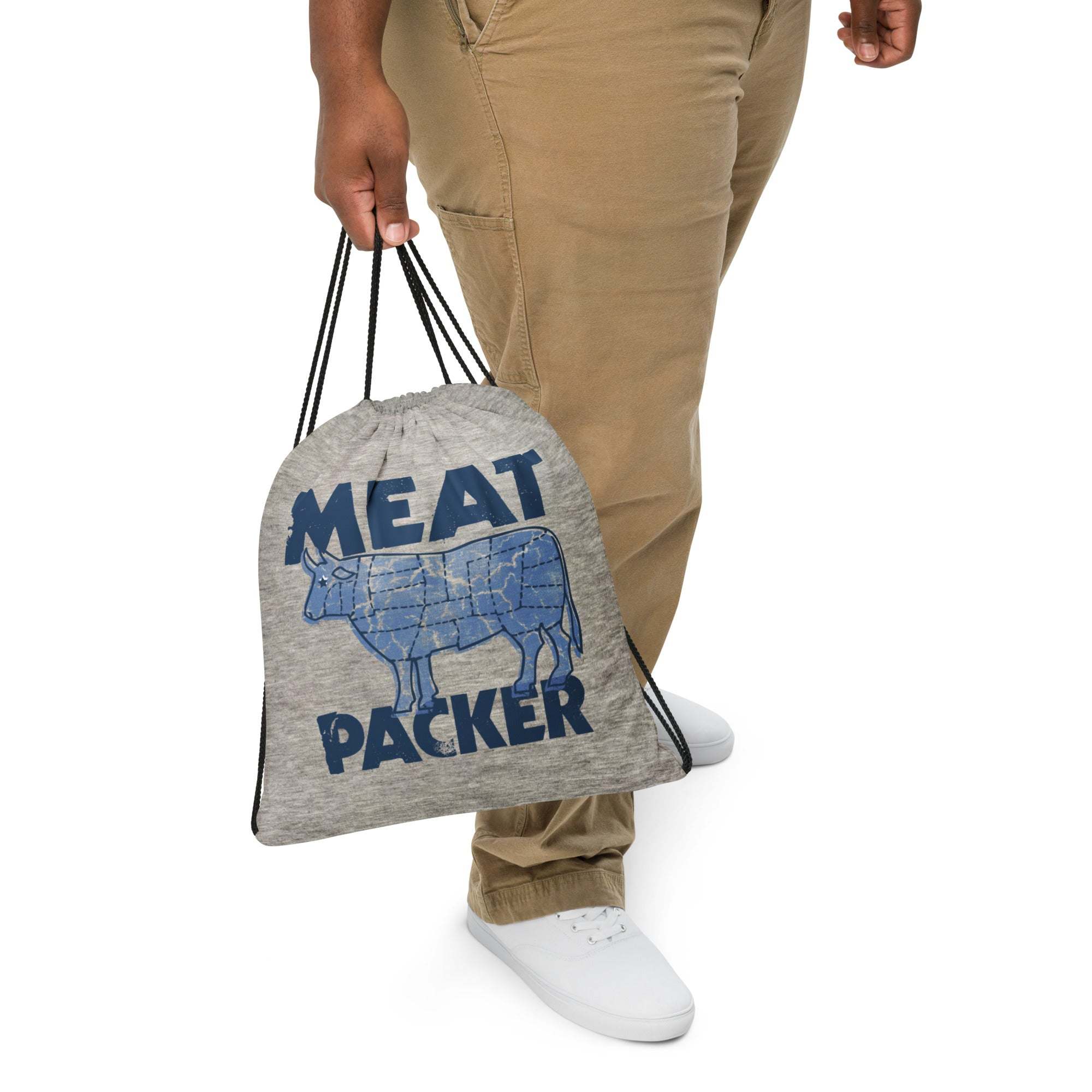 Meat Packer Drawstring Bag being carried, featuring durable 100% polyester material and twin cotton handles, perfect for meat lovers.