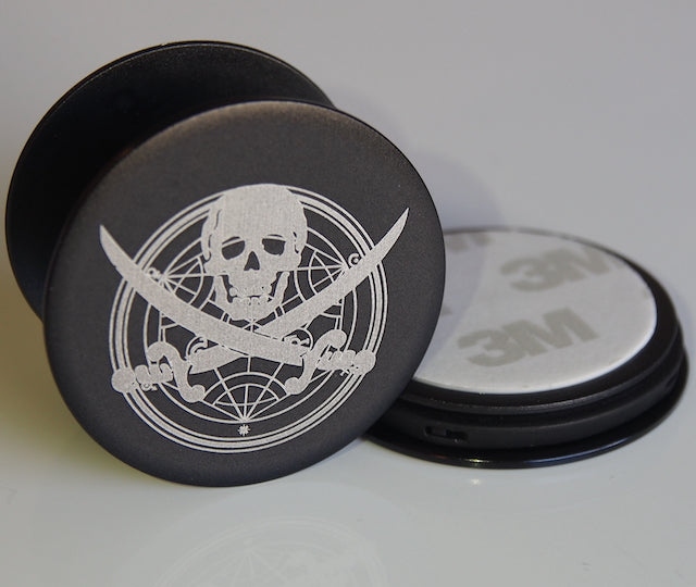 TIM METAL Pop Stand with etched skull design.